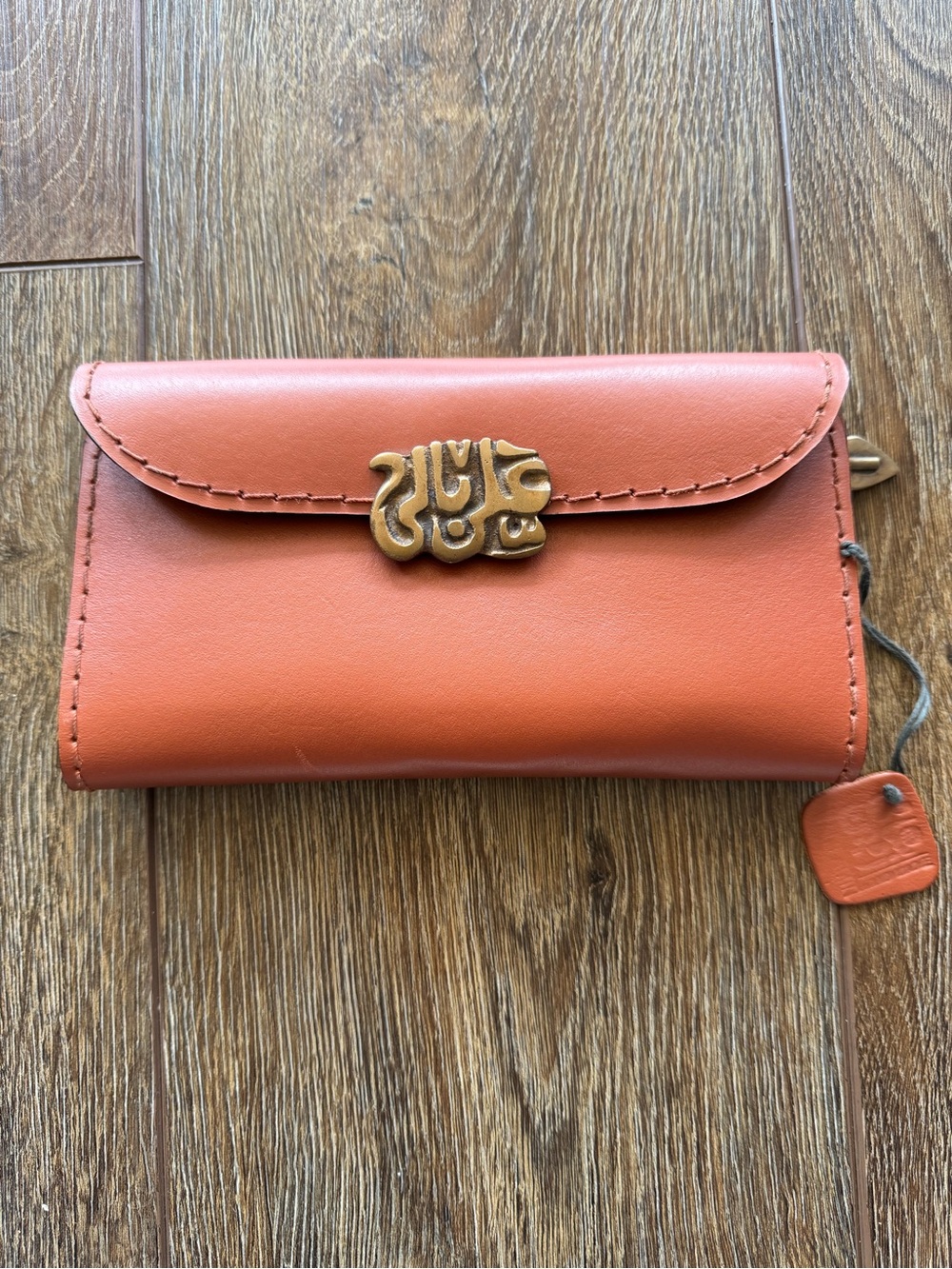 Sami Amin Ala Bali Tooled Leather Wallet with Brass Accent